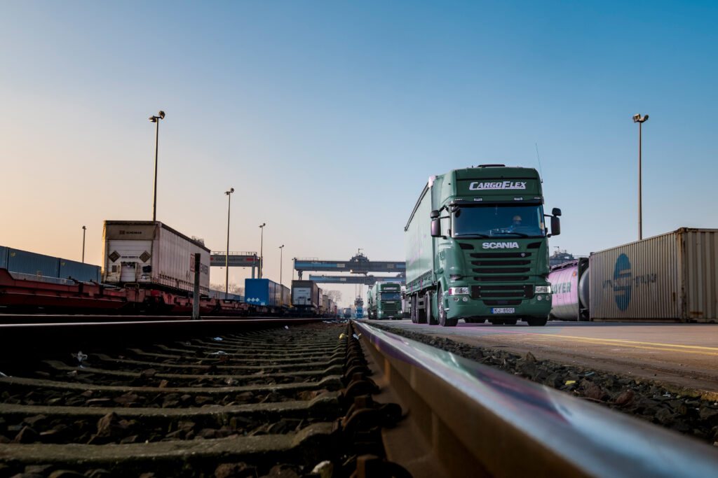 A CargoFlex truck at a rail terminal at dusk